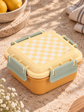 Monnëka lielā pusdienu kārbiņa “Yellow Chess”